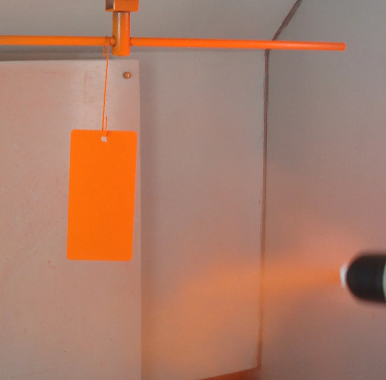 Powder coating applied to a metal sample